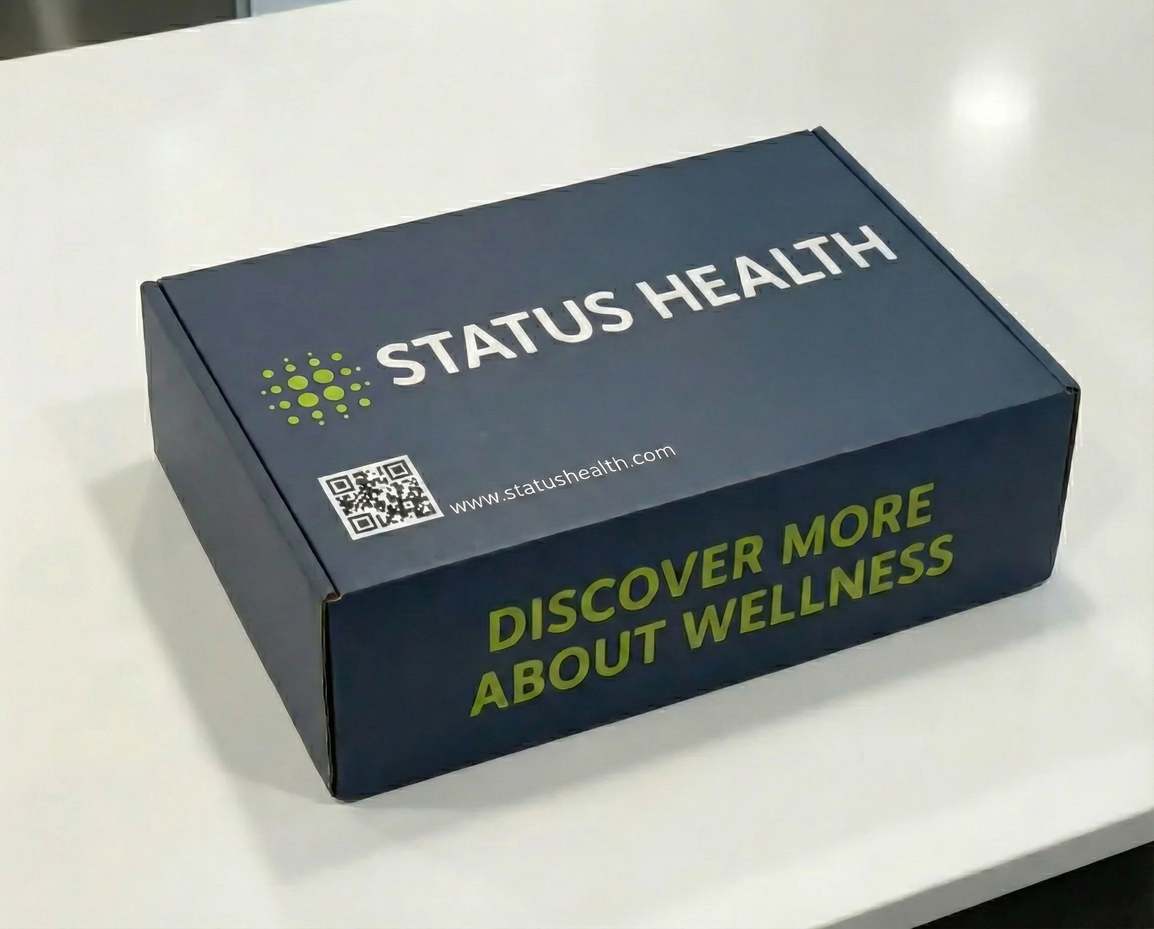 The Status Health at-home test kit box